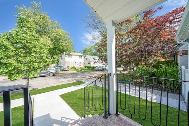 view of patio with a porch and a residential view