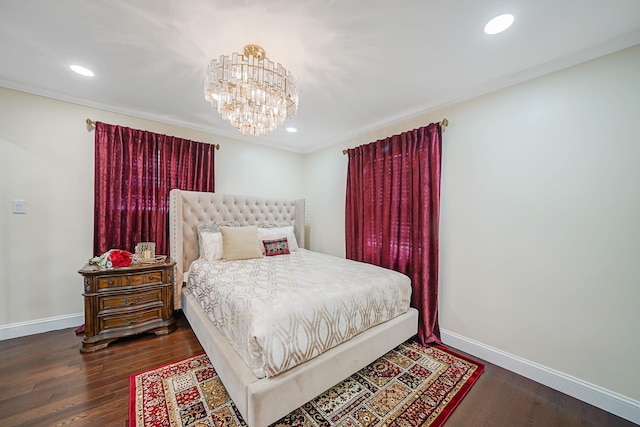 bedroom featuring a chandelier, baseboards, wood finished floors, and recessed lighting