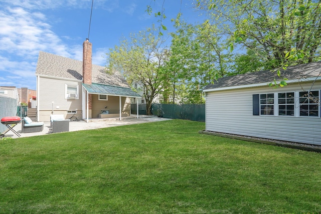 view of yard with a patio area and an outdoor structure