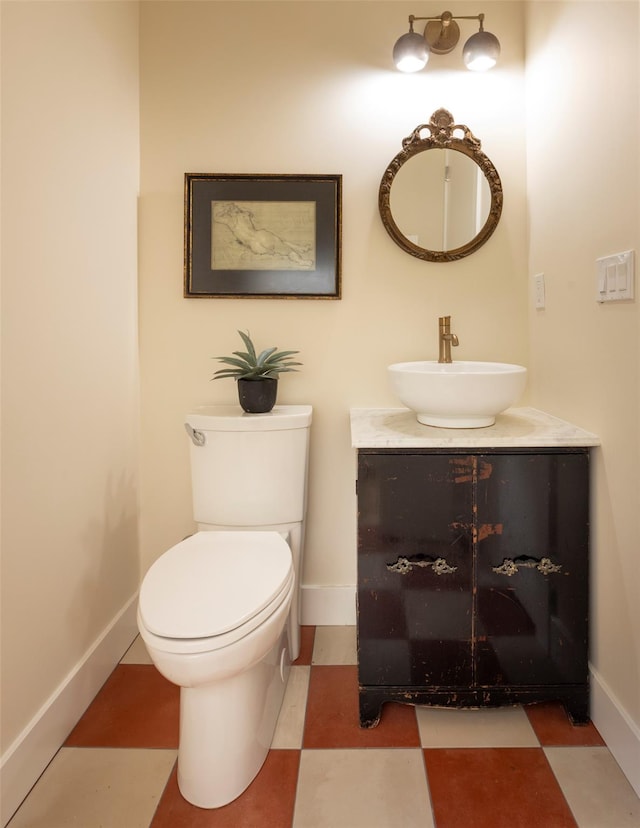 1531 Glasco Tpke, Saugerties, NY 12498 - bathroom with toilet, vanity, baseboards, and tile patterned floors