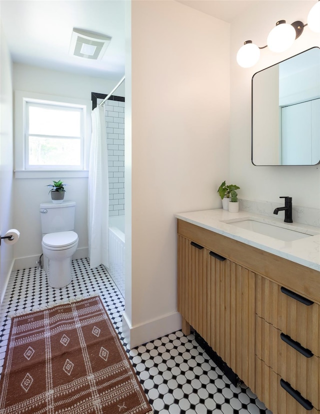 1531 Glasco Tpke, Saugerties, NY 12498 - full bathroom with vanity, toilet, baseboards, and shower / bath combination with curtain