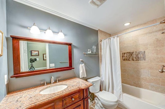 bathroom with toilet, vanity, and shower / bath combo with shower curtain