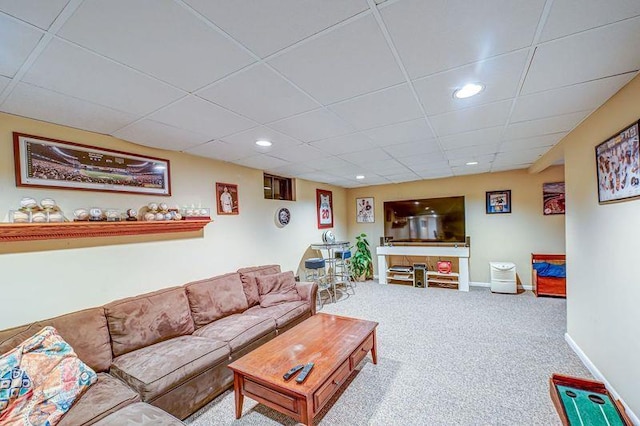 living area with carpet, recessed lighting, baseboards, and a paneled ceiling
