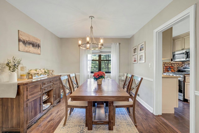 15 Manchester Rd Unit 2L, Eastchester, NY 10709 - dining room with a chandelier and wood finished floors