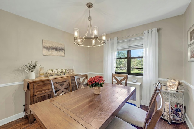 15 Manchester Rd Unit 2L, Eastchester, NY 10709 - dining space featuring a chandelier, dark wood finished floors, and baseboards