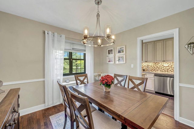 15 Manchester Rd Unit 2L, Eastchester, NY 10709 - dining room with a chandelier, dark wood-type flooring, and baseboards