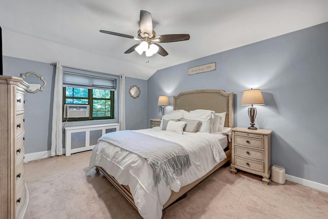 15 Manchester Rd Unit 2L, Eastchester, NY 10709 - bedroom with radiator heating unit, light carpet, baseboards, cooling unit, and lofted ceiling