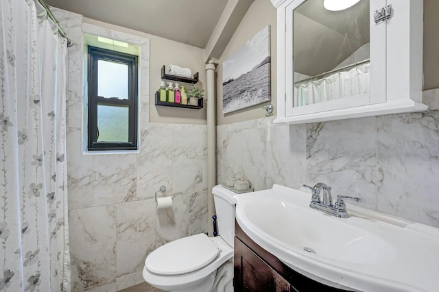 15 Manchester Rd Unit 2L, Eastchester, NY 10709 - bathroom with tile walls, toilet, vanity, and a shower with curtain