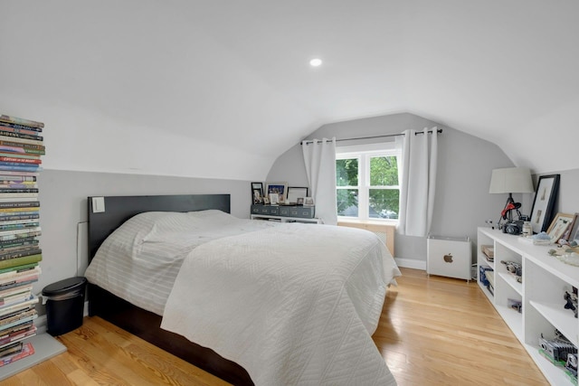 5749 Faraday Ave, Bronx, NY 10471 - bedroom featuring lofted ceiling and light wood-style flooring