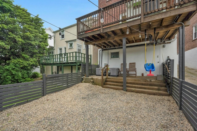5749 Faraday Ave, Bronx, NY 10471 - rear view of house with central AC and a deck
