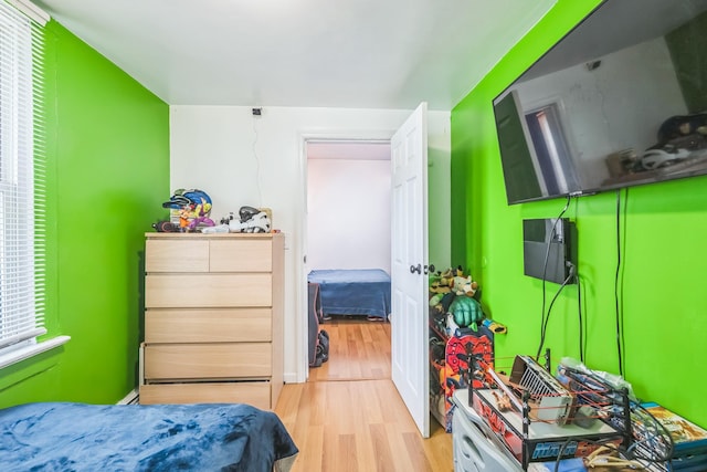 253 N 3rd Ave, Bay Shore, NY 11706 - bedroom featuring light wood finished floors