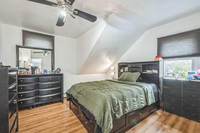 253 N 3rd Ave, Bay Shore, NY 11706 - bedroom featuring wood finished floors, lofted ceiling, and a ceiling fan