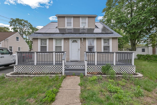 253 N 3rd Ave, Bay Shore, NY 11706 - view of front of home with a porch and roof with shingles