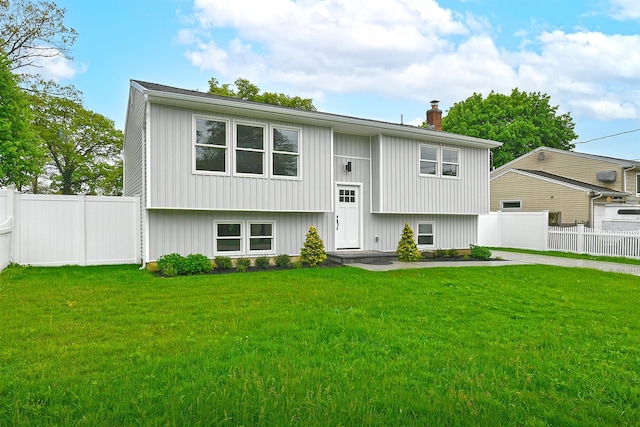 688 Elmwood Rd, West Babylon, NY 11704 - bi-level home with a chimney