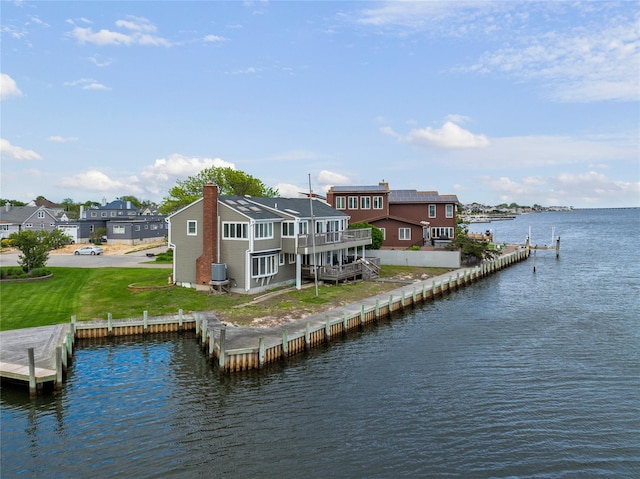 160 Sequams Ln W, West Islip, NY 11795 - back of house with a deck with water view, a yard, and a chimney