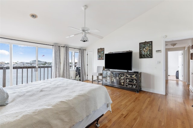 160 Sequams Ln W, West Islip, NY 11795 - bedroom with access to exterior, lofted ceiling, wood finished floors, multiple windows, and baseboards