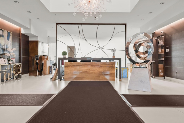 welcome area with a chandelier