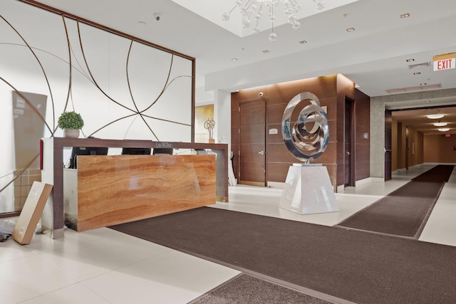 reception featuring a chandelier