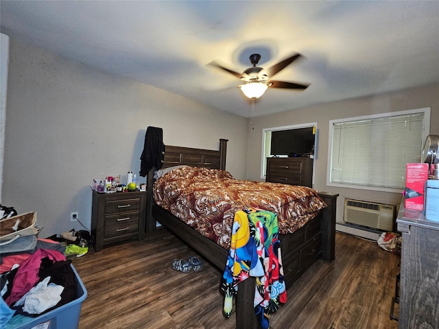 3 Allan Park Mews, Middletown, NY 10940 - bedroom featuring dark wood finished floors, ceiling fan, baseboard heating, and a wall mounted AC