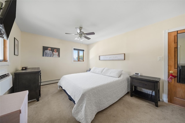 bedroom with baseboard heating, light carpet, a ceiling fan, and baseboards