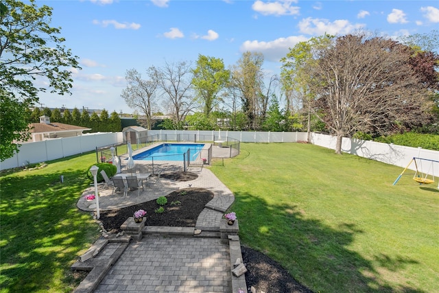 view of yard with a patio and a storage shed