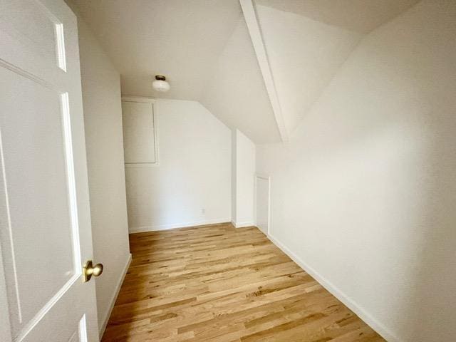 2850 Reeve Rd, Mattituck, NY 11952 - bonus room with light wood finished floors, vaulted ceiling, and baseboards