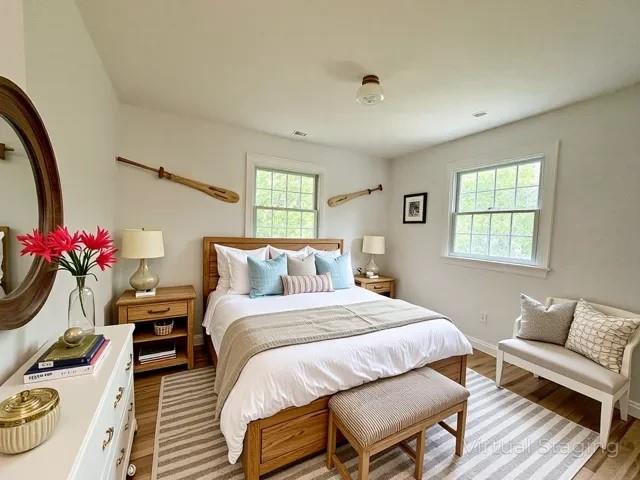 2850 Reeve Rd, Mattituck, NY 11952 - bedroom featuring light wood-style flooring and baseboards