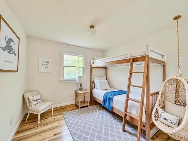 2850 Reeve Rd, Mattituck, NY 11952 - bedroom with wood finished floors and baseboards
