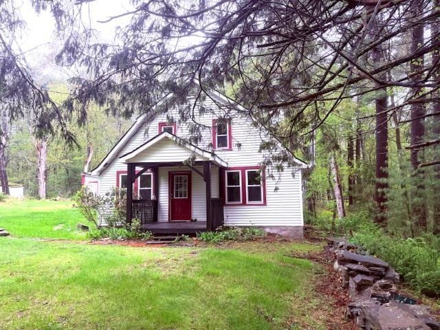 38 Eldred Yulan Rd, Eldred, NY 12732 - view of front of property featuring a porch and a front yard