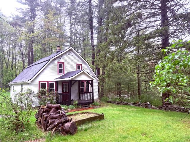38 Eldred Yulan Rd, Eldred, NY 12732 - view of front of house featuring a gambrel roof, a front lawn, covered porch, and a chimney