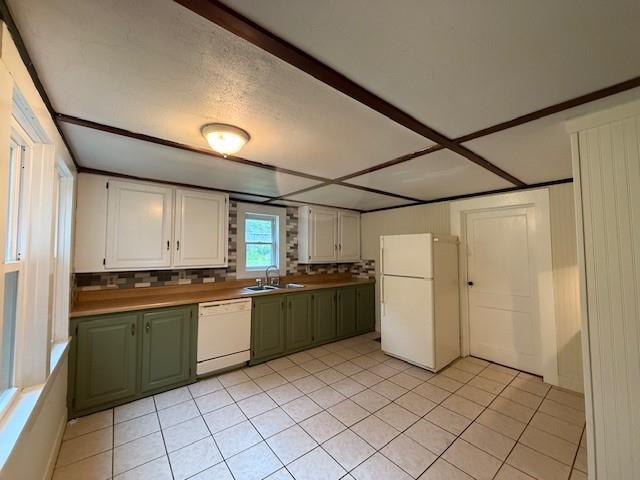 38 Eldred Yulan Rd, Eldred, NY 12732 - kitchen featuring white appliances, green cabinets, light tile patterned floors, white cabinets, and a sink