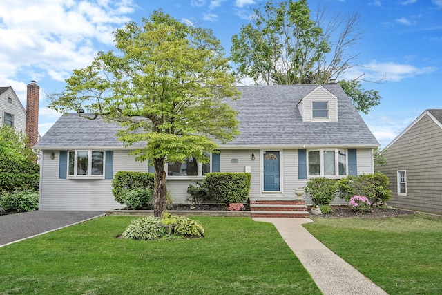 27 Amby Ave, Plainview, NY 11803 - cape cod-style house featuring a front yard and a shingled roof