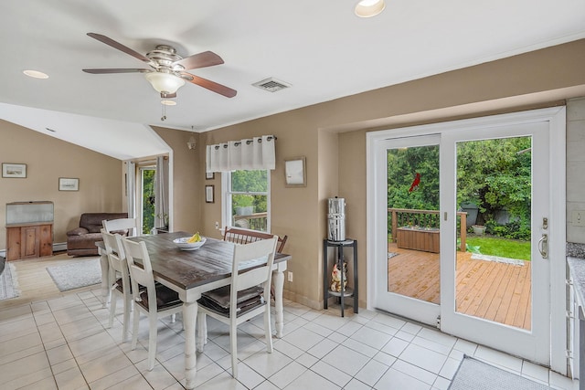 27 Amby Ave, Plainview, NY 11803 - dining area with ceiling fan, light tile patterned flooring, recessed lighting, baseboards, and lofted ceiling