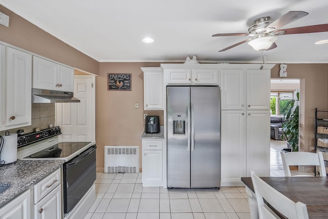 27 Amby Ave, Plainview, NY 11803 - kitchen featuring stainless steel fridge with ice dispenser, under cabinet range hood, electric range oven, radiator heating unit, and white cabinetry