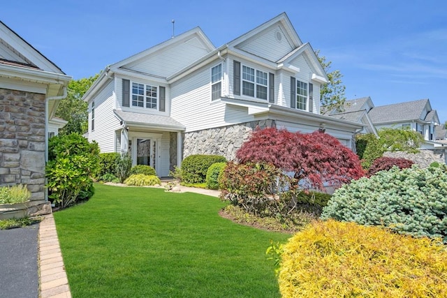 30 Julia Cir, Middle Island, NY 11953 - view of front of home with stone siding and a front yard