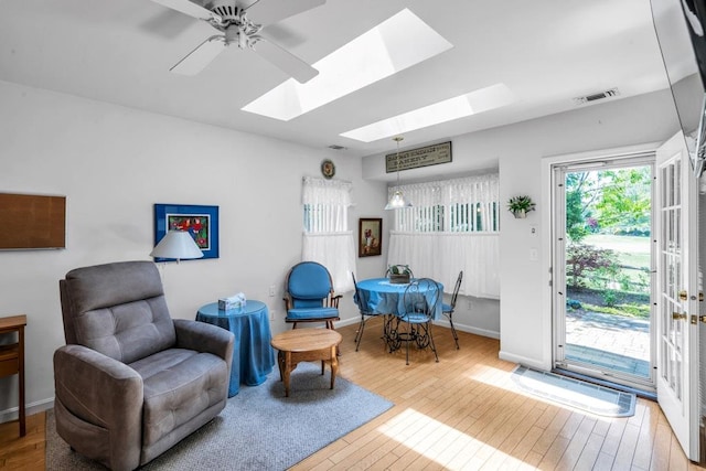 30 Julia Cir, Middle Island, NY 11953 - sitting room with wood-type flooring, a skylight, baseboards, and ceiling fan