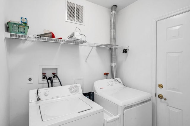 30 Julia Cir, Middle Island, NY 11953 - laundry room featuring washing machine and dryer