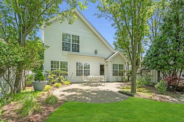 30 Julia Cir, Middle Island, NY 11953 - rear view of property with a patio and a lawn