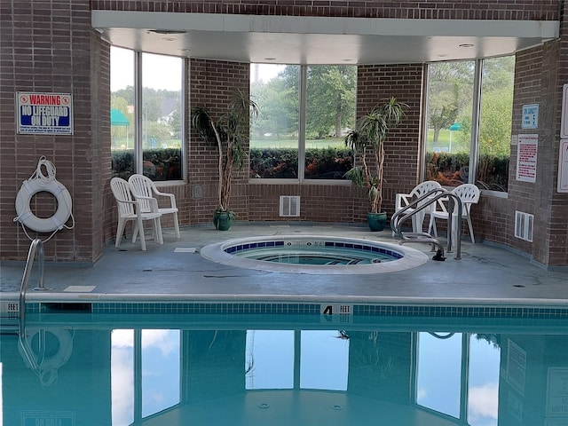 30 Julia Cir, Middle Island, NY 11953 - indoor pool with an in-ground hot tub and a patio