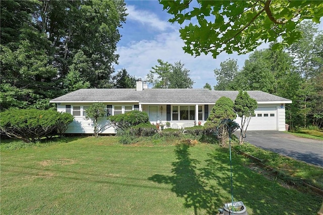 198 Dillon Rd, Monticello, NY 12701 - ranch-style house with a garage, asphalt driveway, a front lawn, and a chimney