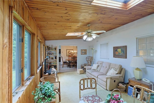 198 Dillon Rd, Monticello, NY 12701 - living area with a skylight, carpet, ceiling fan, wooden ceiling, and a chandelier