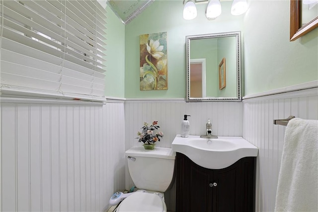 198 Dillon Rd, Monticello, NY 12701 - half bath featuring wainscoting, toilet, and vanity