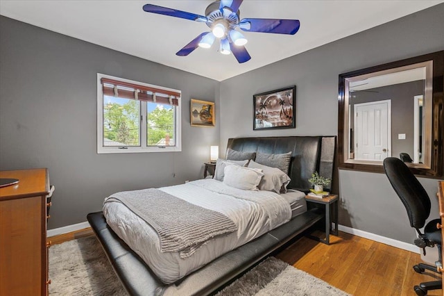 26 Tioga Dr, Jericho, NY 11753 - bedroom with wood finished floors, baseboards, and a ceiling fan