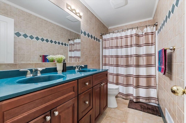 26 Tioga Dr, Jericho, NY 11753 - bathroom with tile walls, crown molding, tile patterned floors, double vanity, and toilet