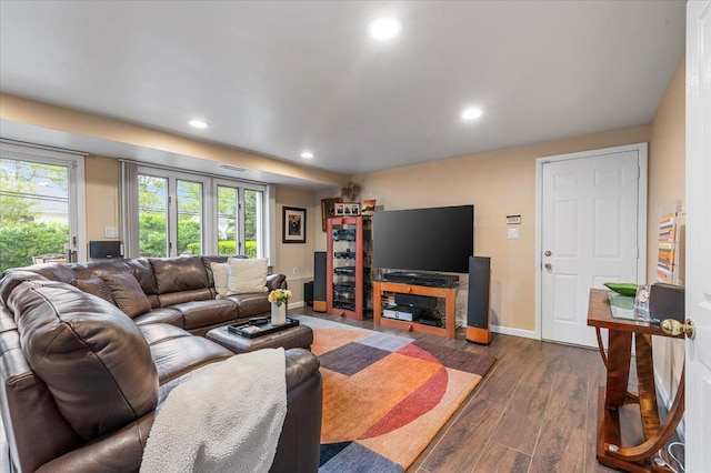 26 Tioga Dr, Jericho, NY 11753 - living room with recessed lighting, wood finished floors, and baseboards