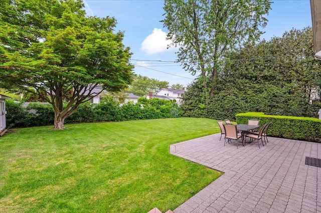 26 Tioga Dr, Jericho, NY 11753 - view of grassy yard with a patio area