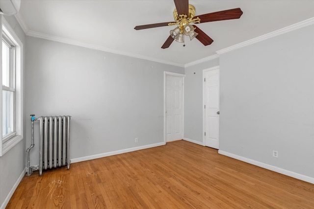 119-64 177th St, Saint Albans, NY 11434 - unfurnished room with radiator heating unit, ornamental molding, light wood-style floors, ceiling fan, and baseboards