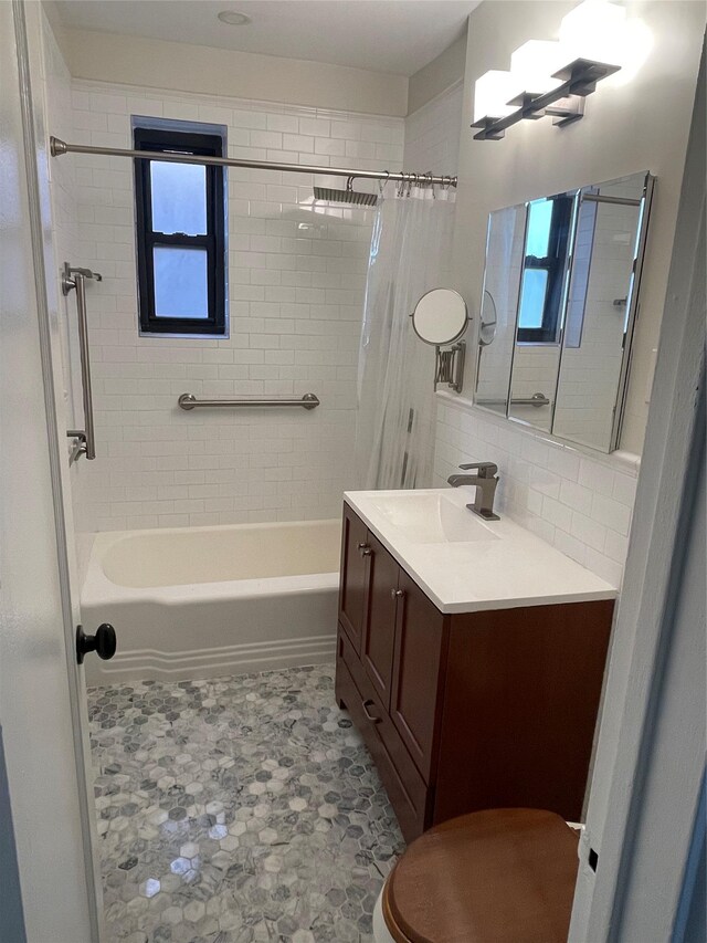88-10 32nd Ave Unit 201, East Elmhurst, NY 11369 - bathroom with shower / bath combo, vanity, and decorative backsplash