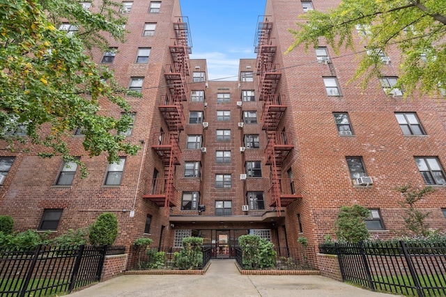 88-10 32nd Ave Unit 201, East Elmhurst, NY 11369 - view of apartment building / complex featuring fence