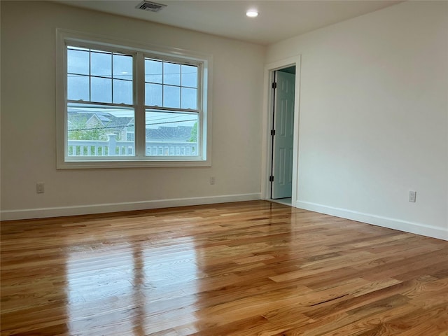 139 Miller Ave SW, Amityville, NY 11701 - empty room featuring light wood-type flooring, baseboards, and recessed lighting